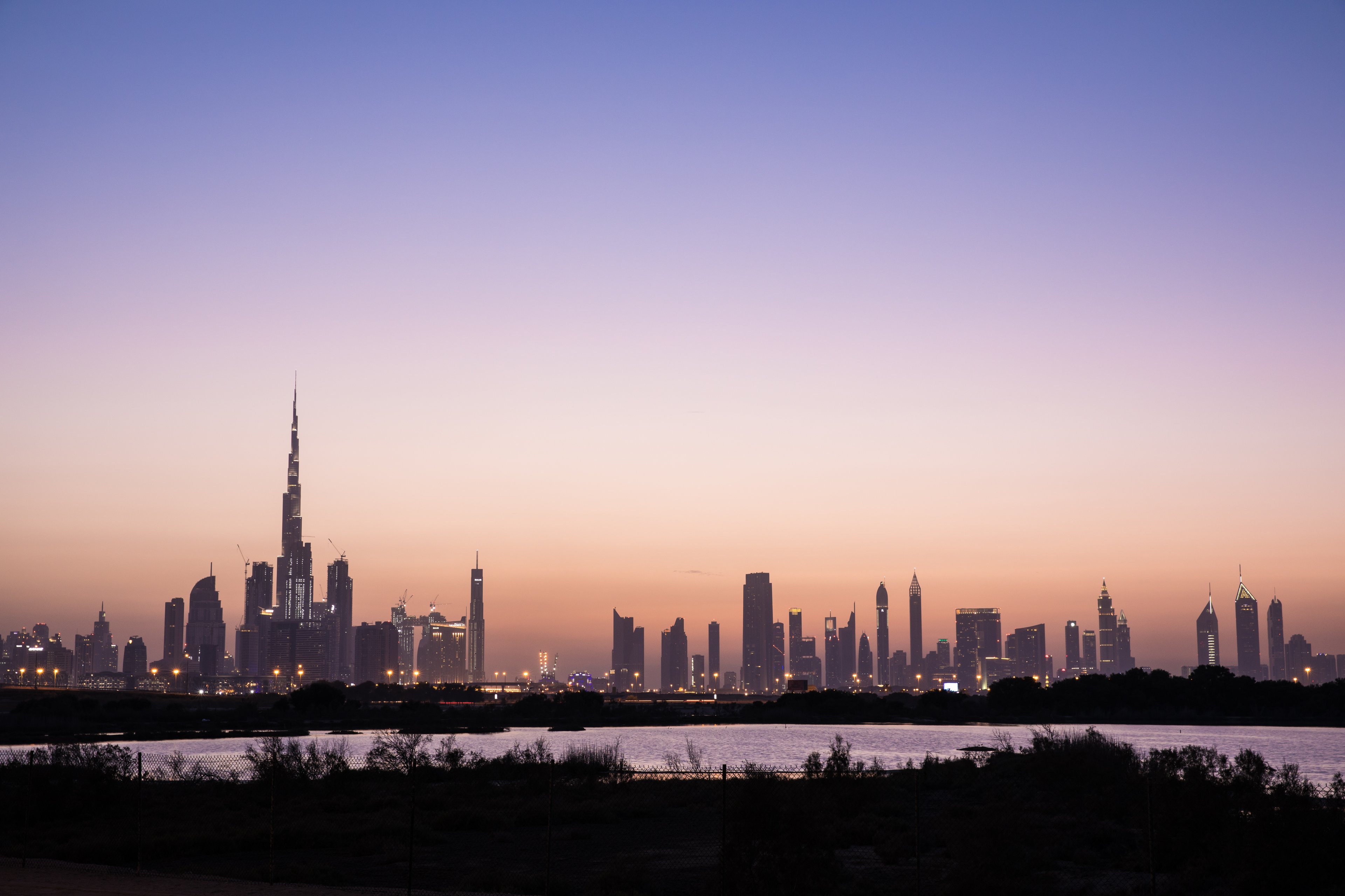 Dubai skyline at sunset.