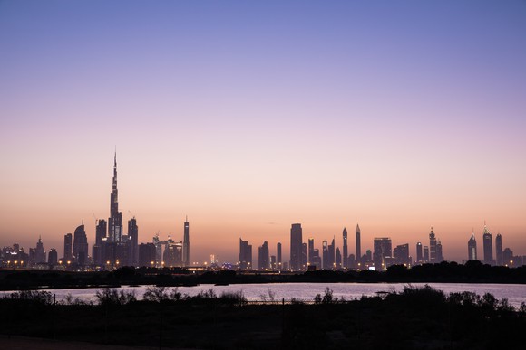 Dubai skyline at sunset.