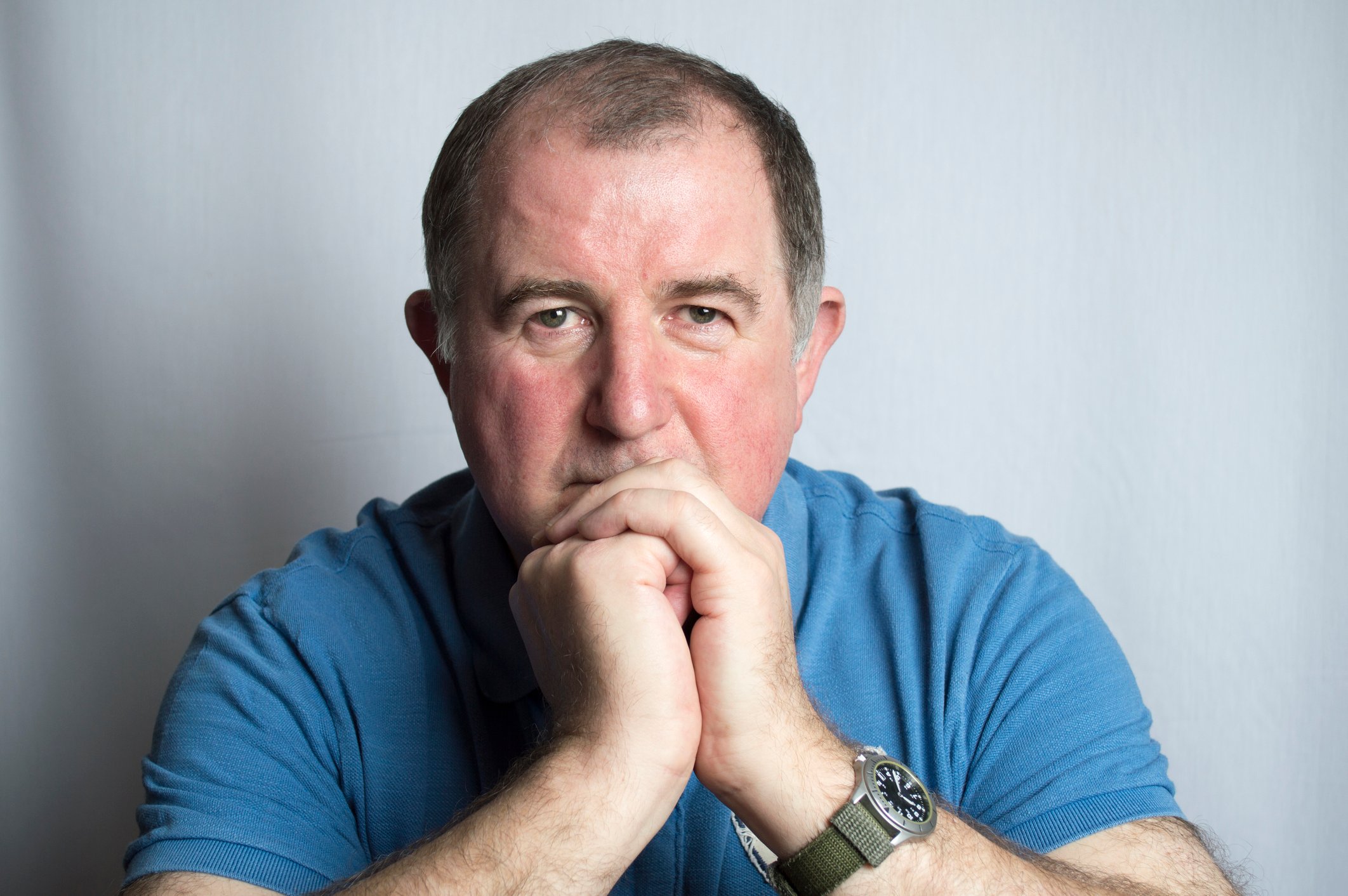 Serious-looking older man