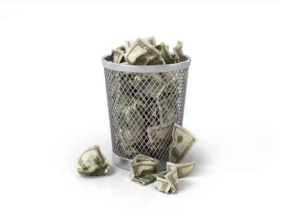 Money in wastebasket