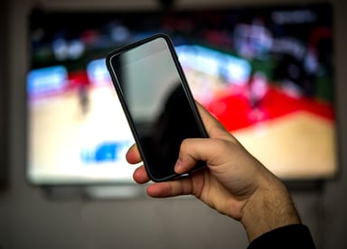 Cable Industry Wireless Phone TV in Background
