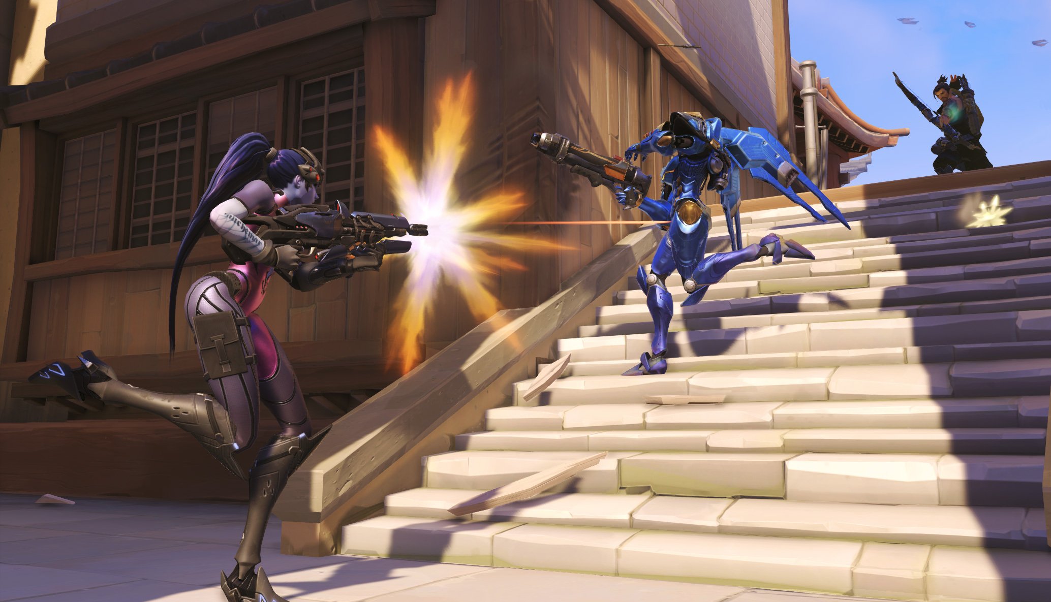 Screenshot of Overwatch gameplay with two in-game characters shooting at each other.