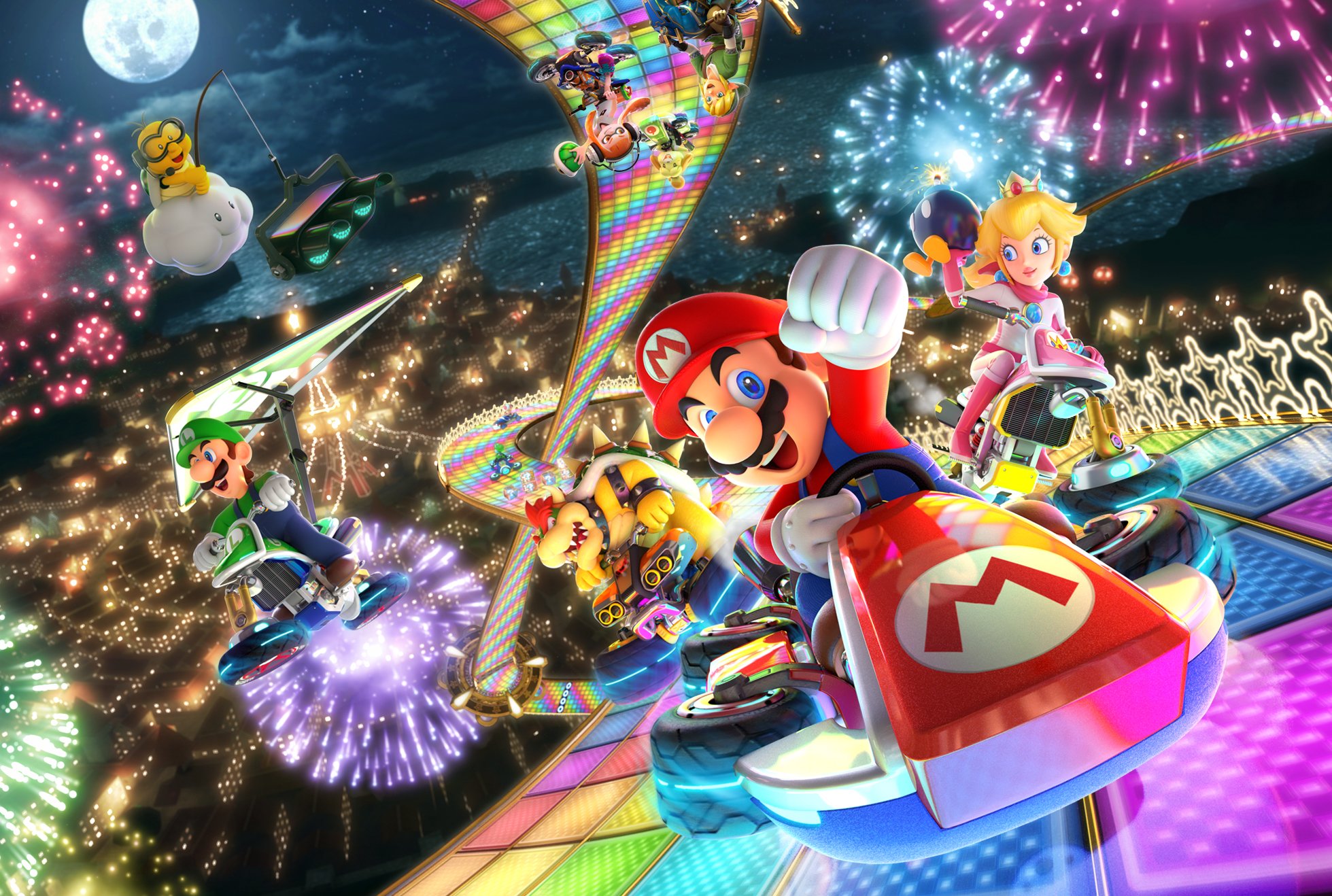 "Mario Kart" characters racing on a rainbow track.