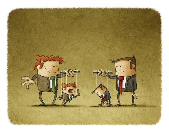 Two cartoon men in suits operate puppets of themselves.