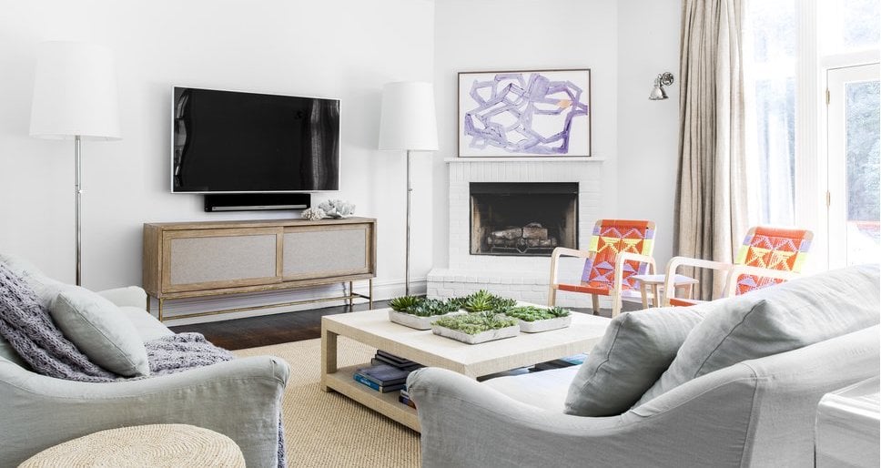 Grey furniture sitting in a living room.