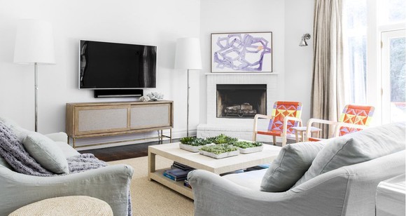 Grey furniture sitting in a living room.