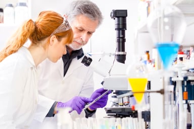 Male and female scientists in lab