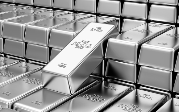 Silver bars in piles