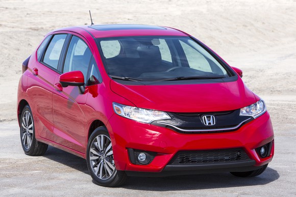 A red Honda Fit.
