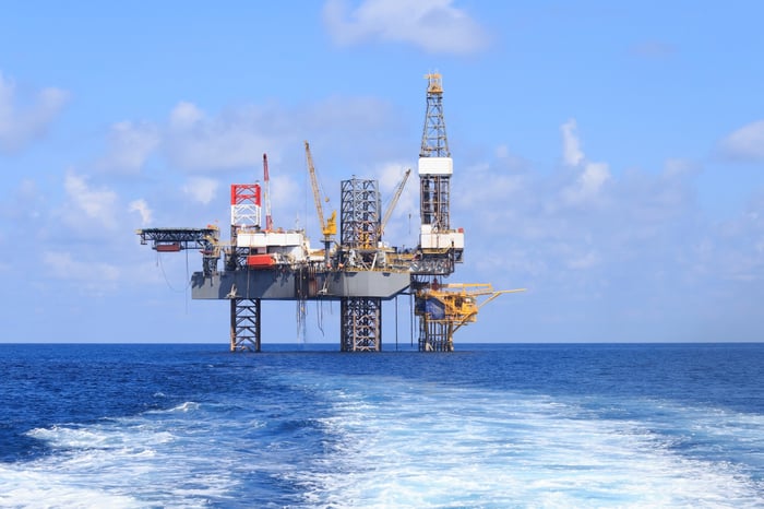 An oil rig at sea.