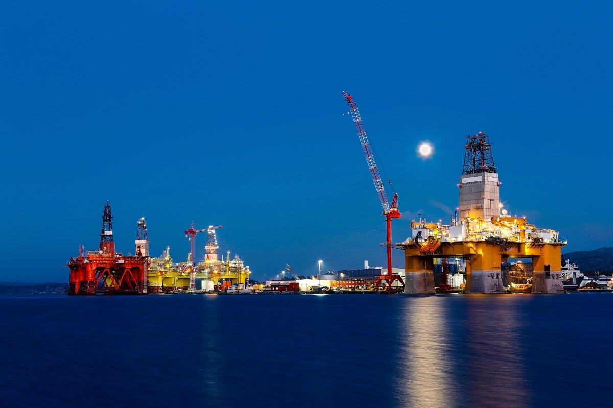 Offshore oil rig at night. 