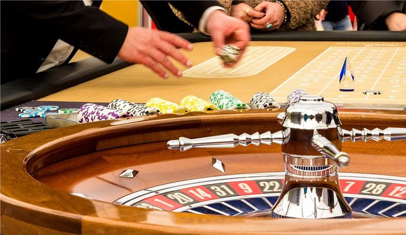 Gamblers play roulette.