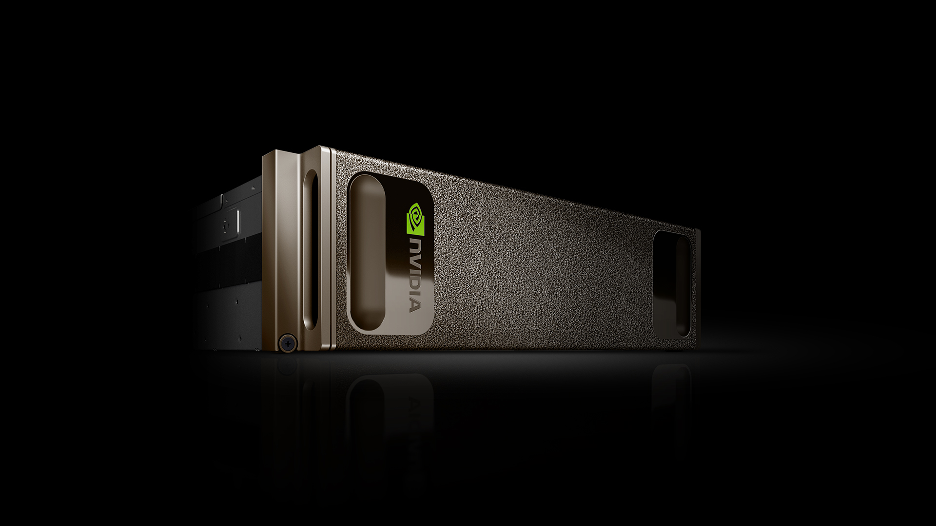 Dark grey aluminum chassis on its side against black ground with NVIDIA logo stamped on its side.