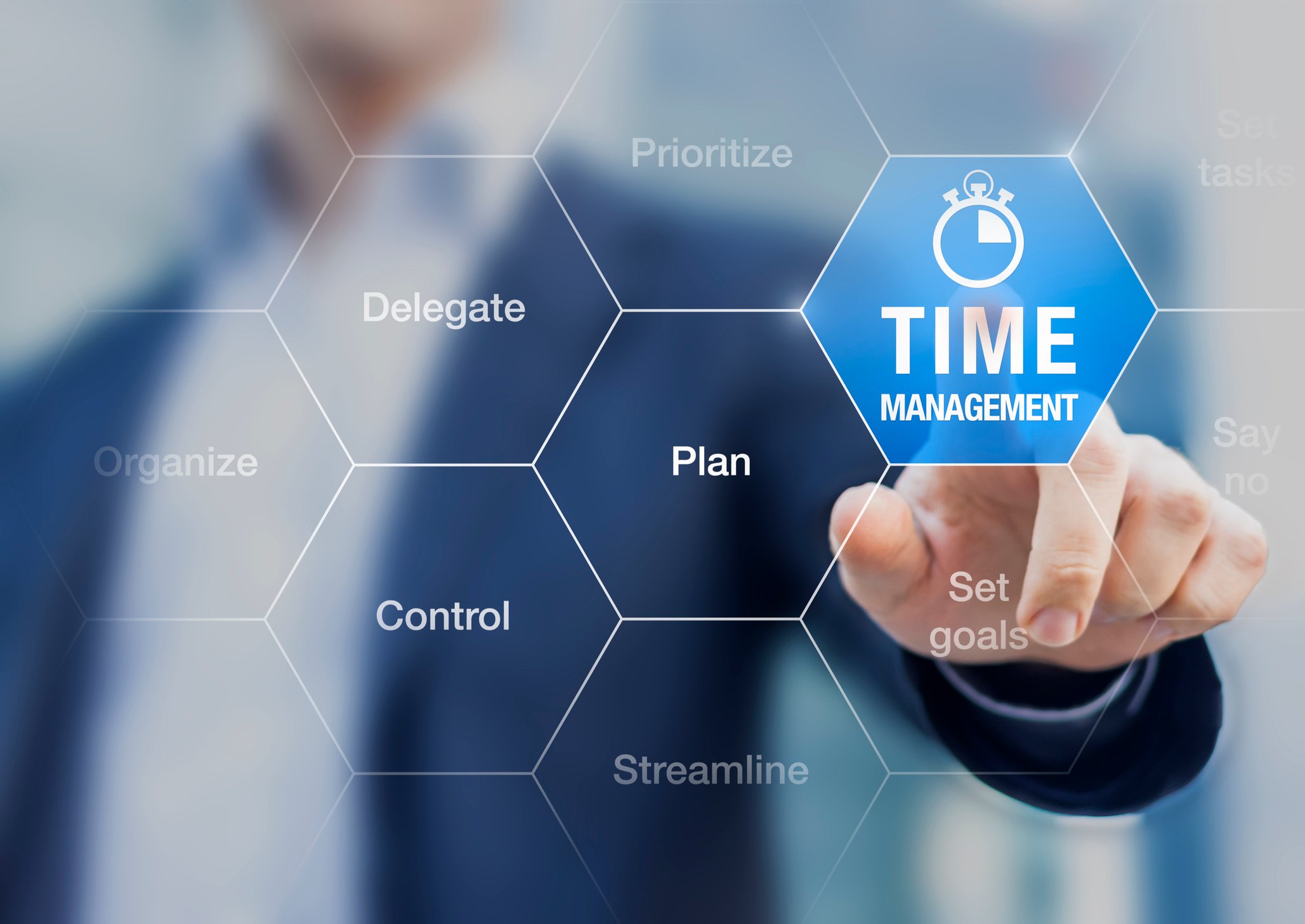 A man pointing to a "time management" icon