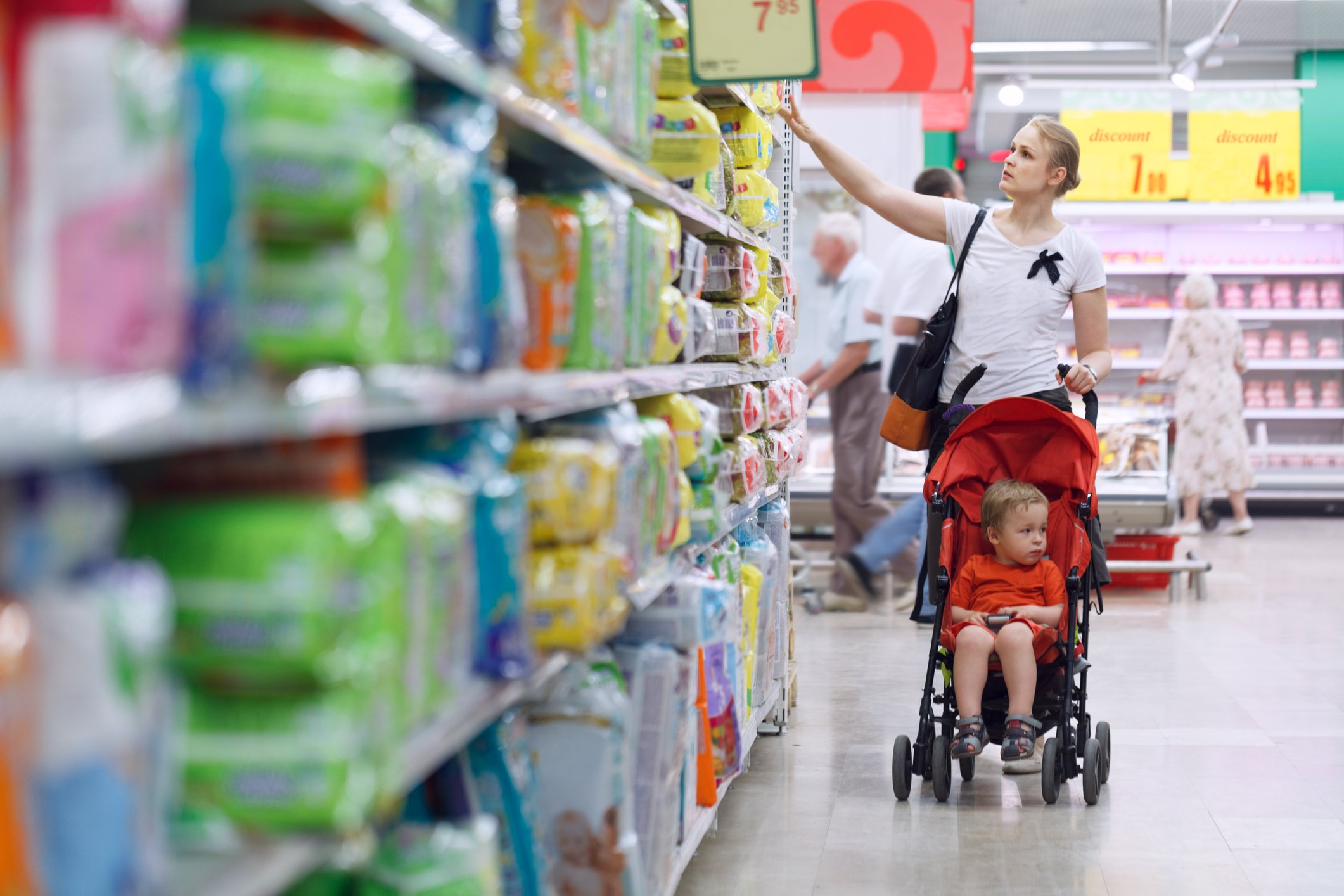 A woman shopping for diapers.