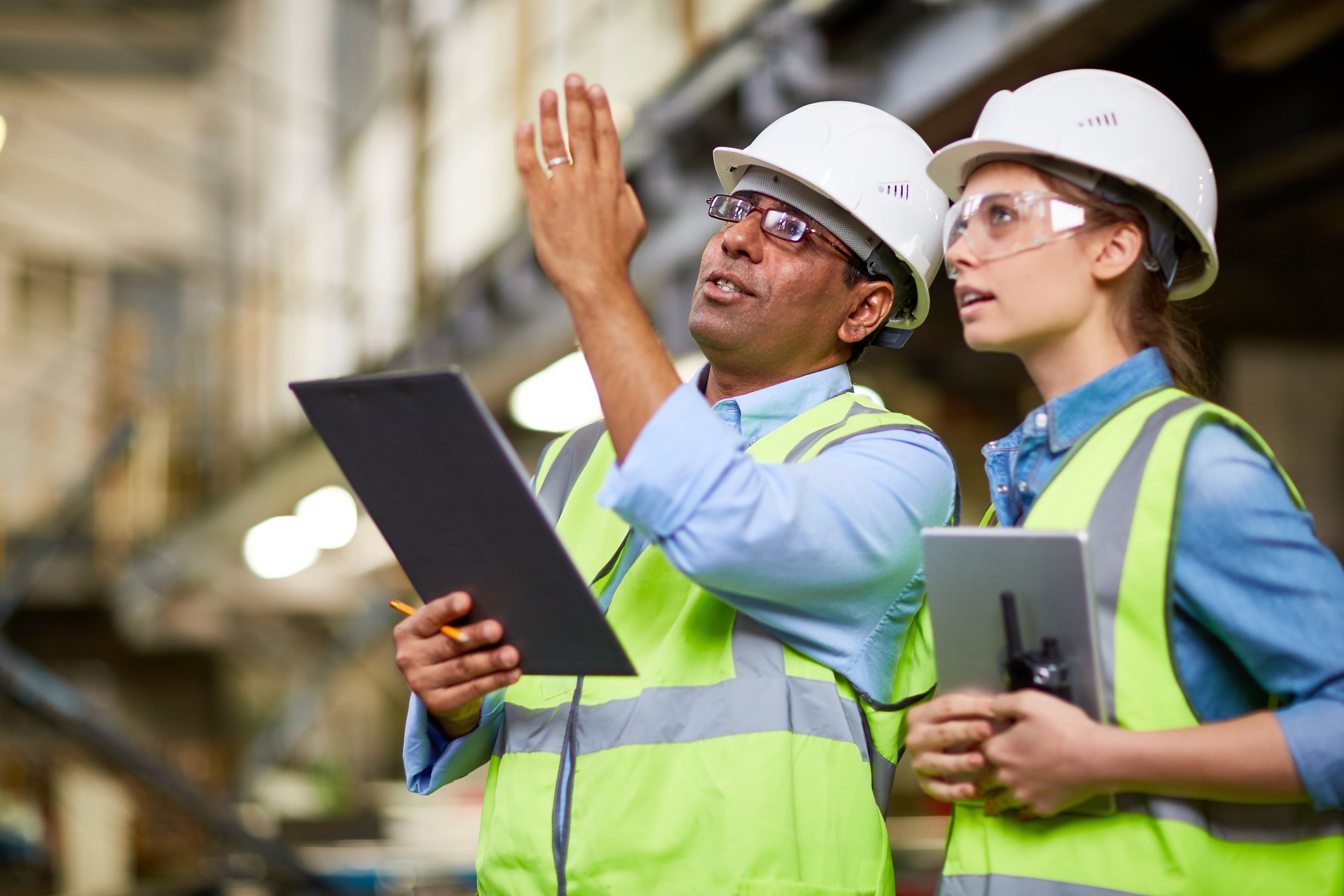 Construction supervisors monitoring a job site