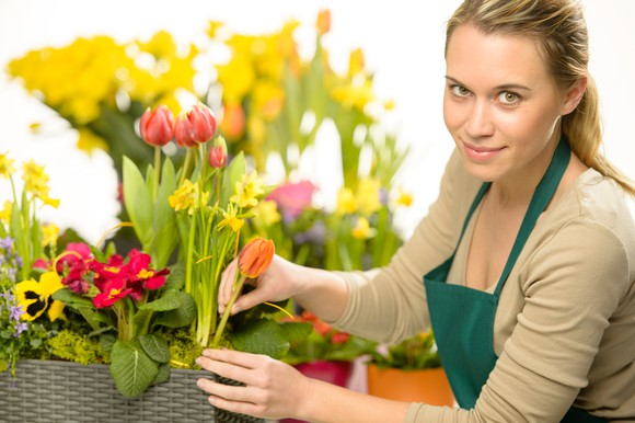A florist prepares a bouquet.