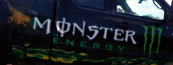 Monster Beverage logo on a truck.