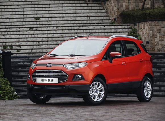 An orange Ford EcoSport SUV with Chinese license plate.