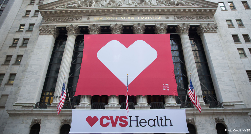 A CVSHealth banner showing a heart hangs from a building 