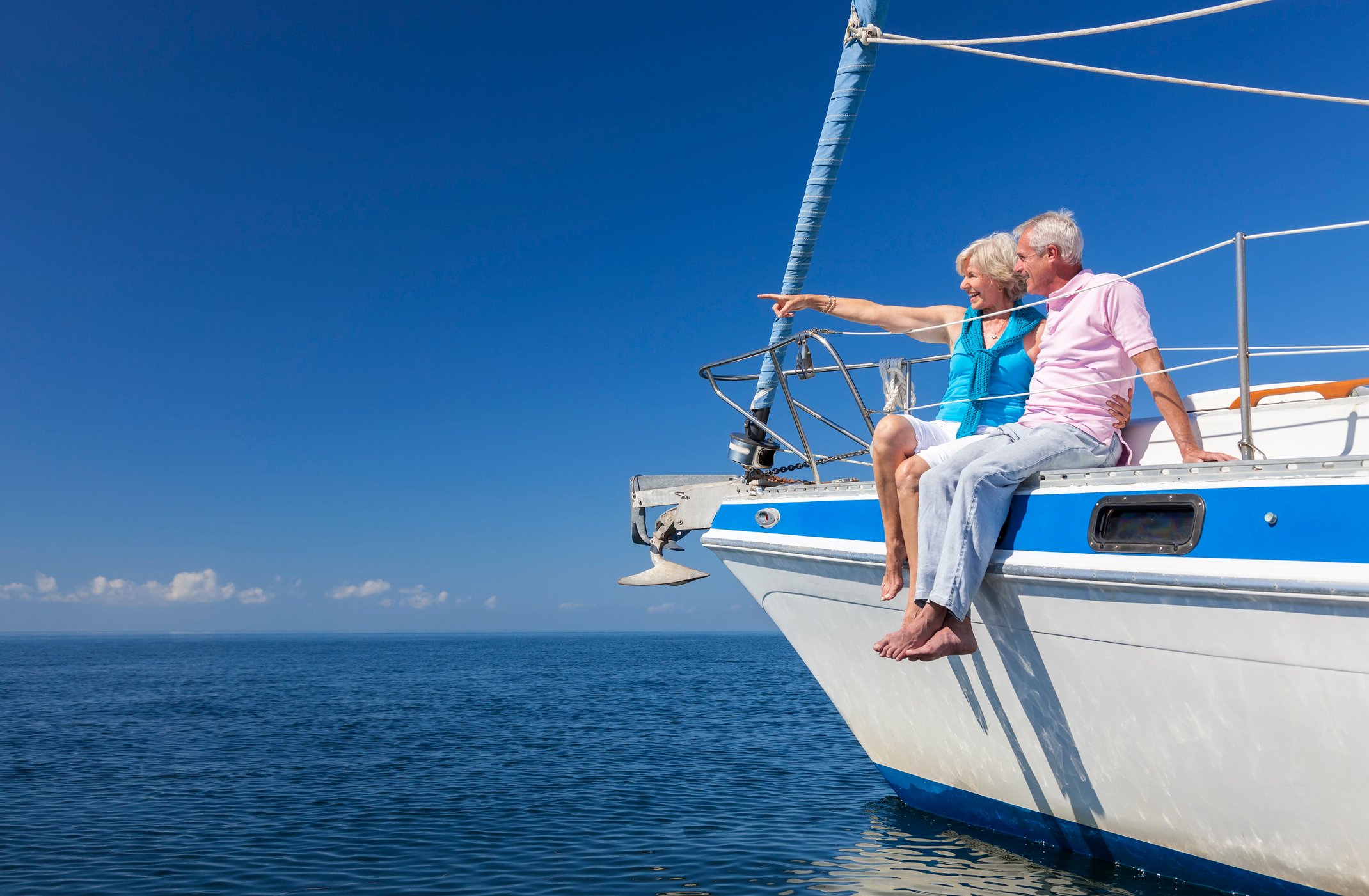 Senior couple on a sailboat