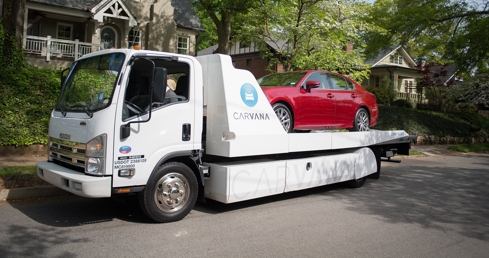 A car being delivered by Carvana's fleet.