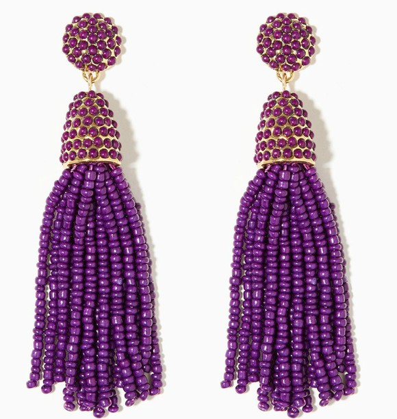 A pair of long purple earrings.