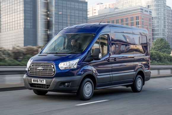 A blue Ford Transit van in London.