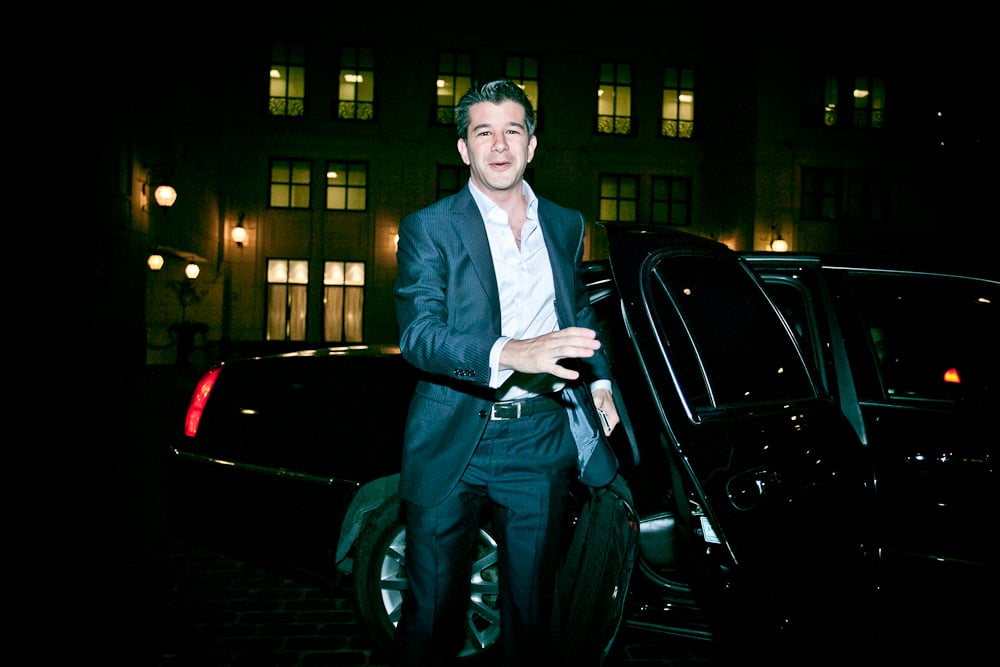 Uber CEO Travis Kalanick is shown getting out of a black car.