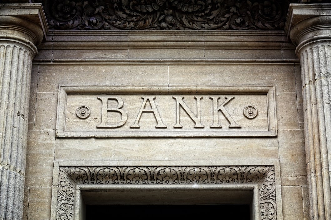 photo of word "bank" in marble