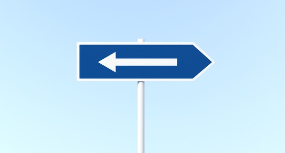 Arrow sign post with mistake