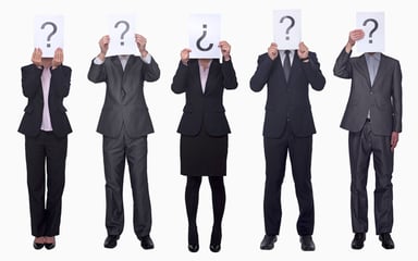 Question marks held by 5 people