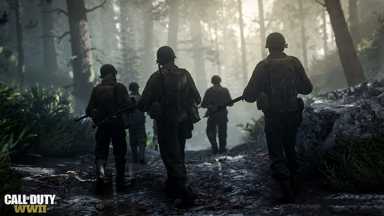 Five soldiers walk through a forest in "Call of Duty: WW2"