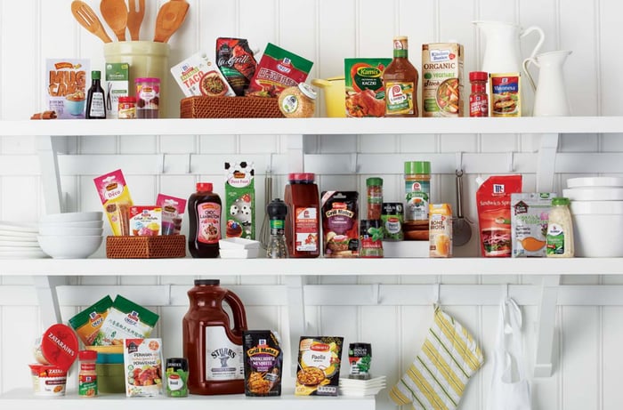 Kitchen shelves displaying McCormick products.