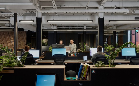 Employees working at Slack's office in Melbourne