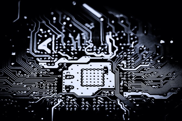 Black and white close-up of circuit board.