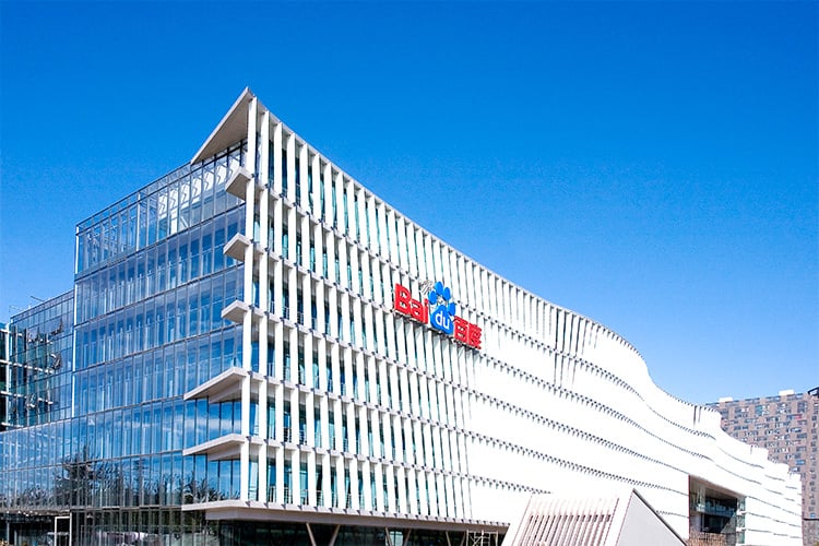 Large building with Baidu logo on the side.
