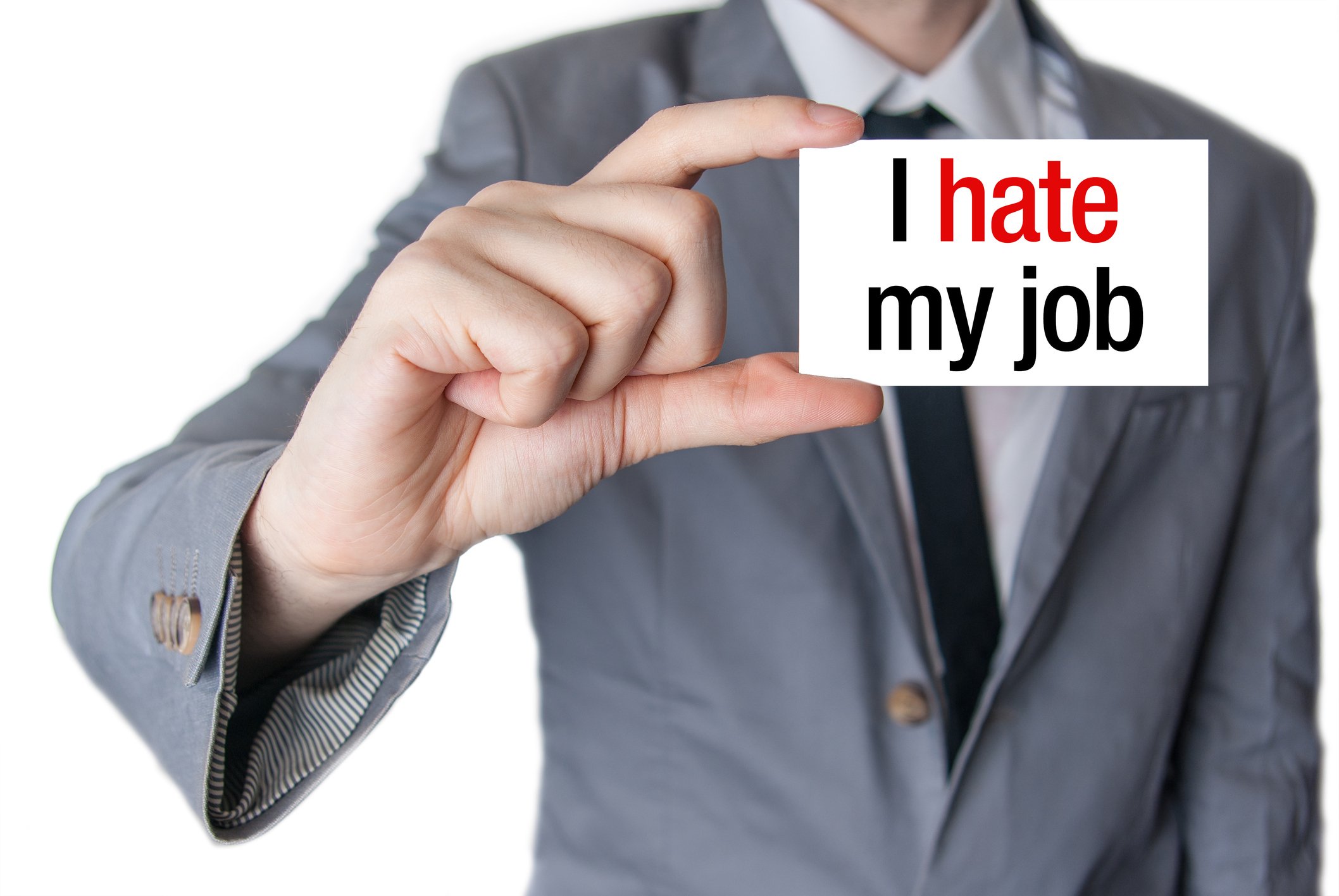 Man holding card stating "I hate my job"