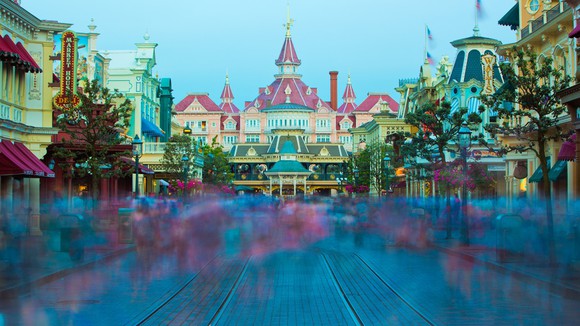 A time-lapse photo of a moving crowd.