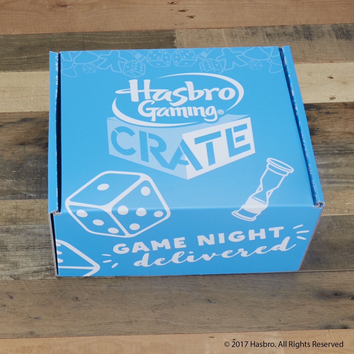 A blue box labeled Hasbro Gaming Crate -- Game Night delivered."