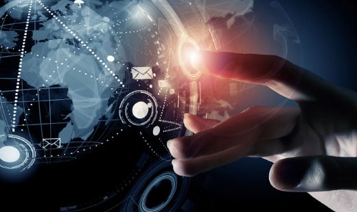 A man touches a screen with email icons and an image of the globe.