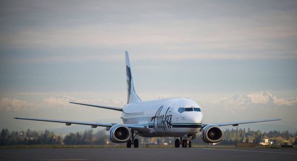 An Alaska airplane on the runway.