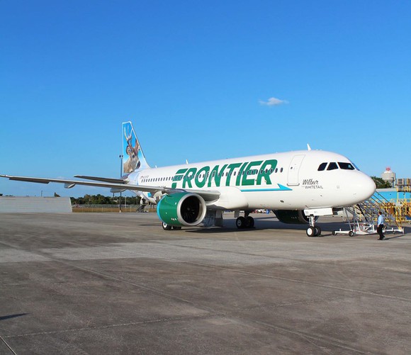 A Frontier airplane on the ground.