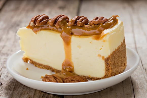 Cheesecake with walnuts and caramel on top