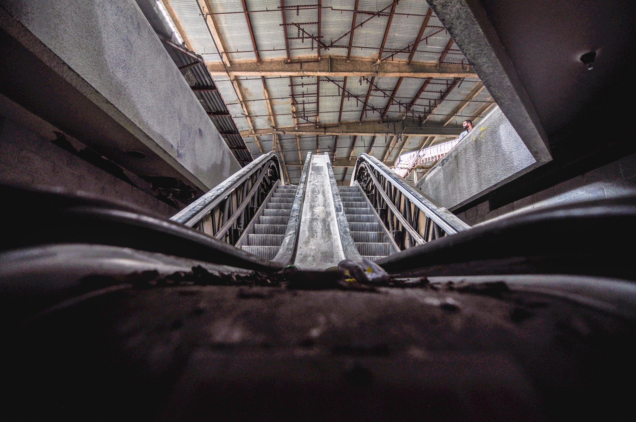 A view from the bottom on an escelator in an abandoned mall.