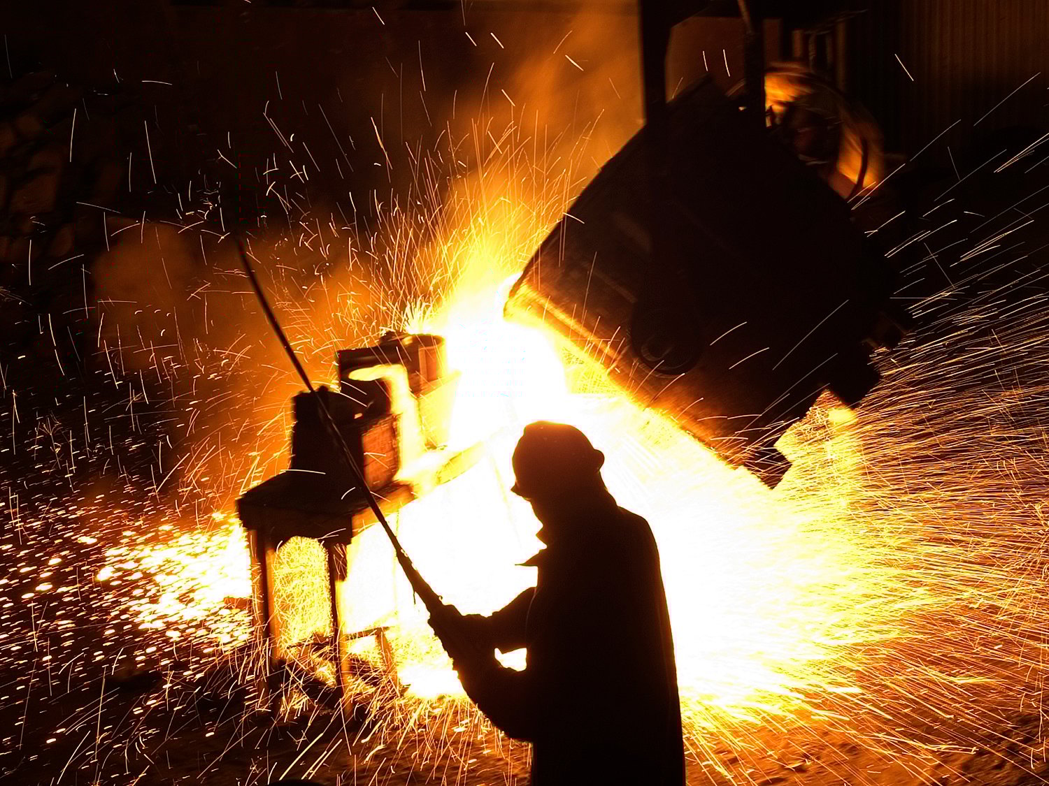 Steel worker in foundry.