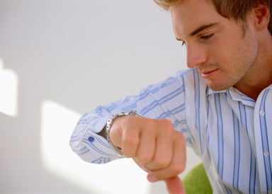 Man looking at his watch
