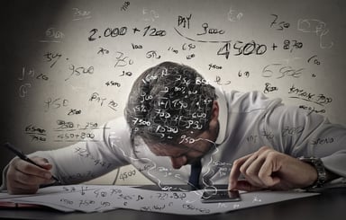 Man calculating numbers