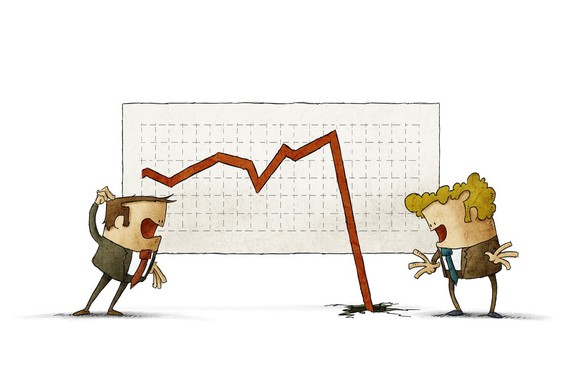 Cartoon of business men standing in front of a declining chart