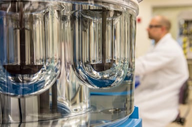 Vertex scientist in lab